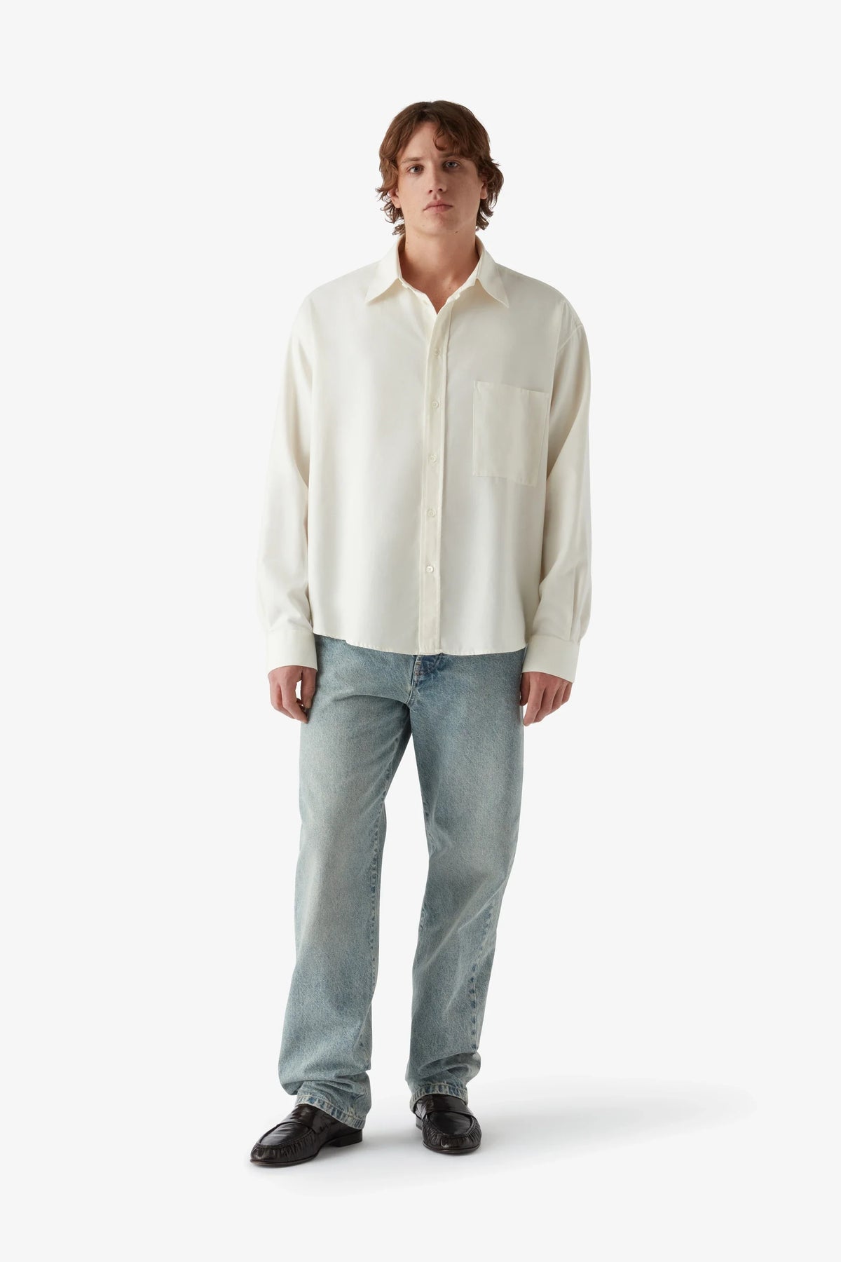 
Tom Straight Jean in light wash — on-model view 12