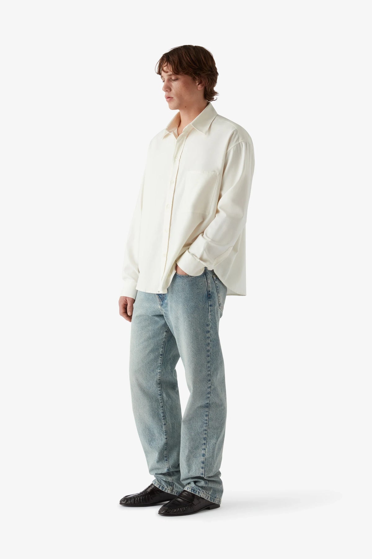 
Tom Straight Jean in light wash — on-model view 13