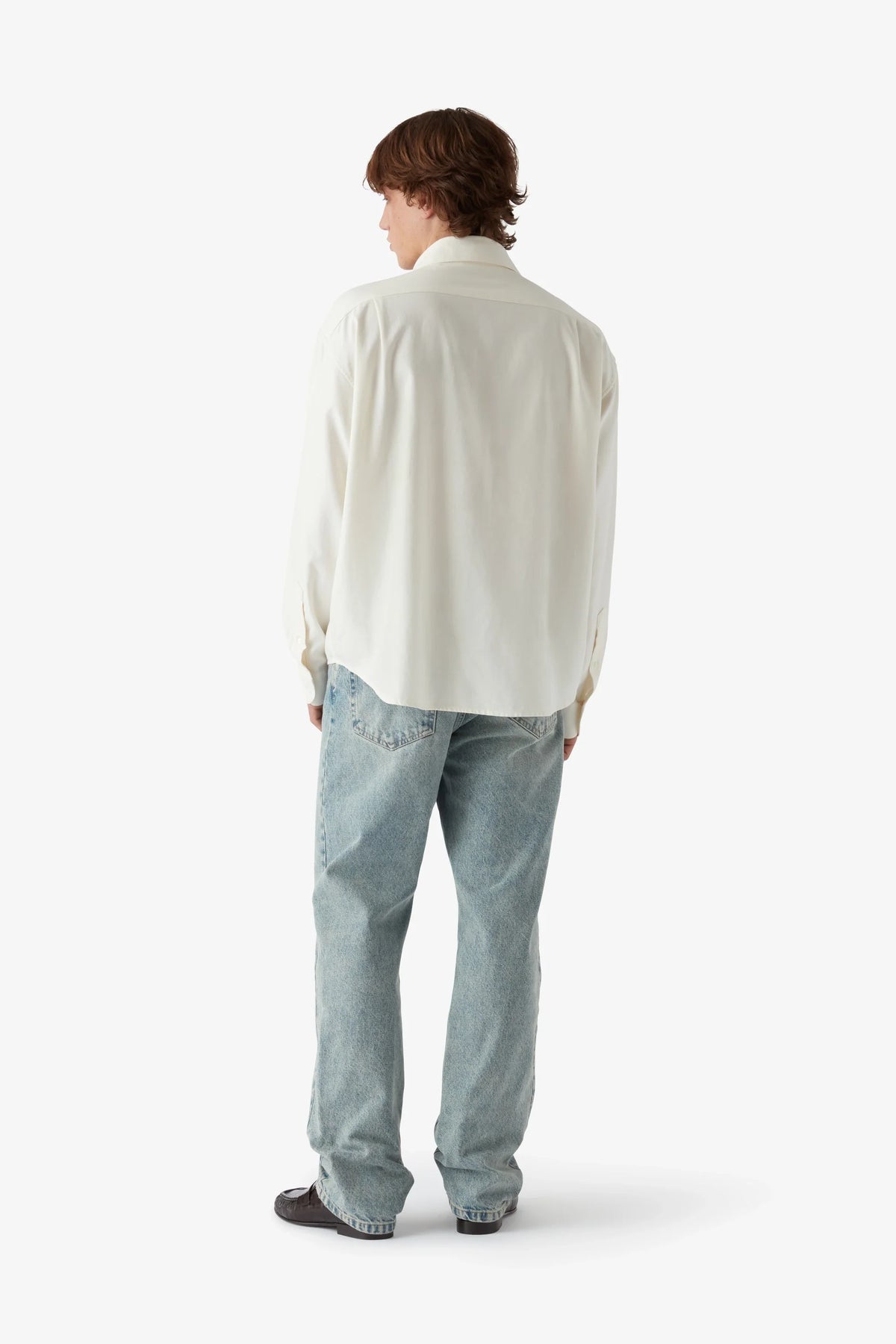 
Tom Straight Jean in light wash — on-model view 14